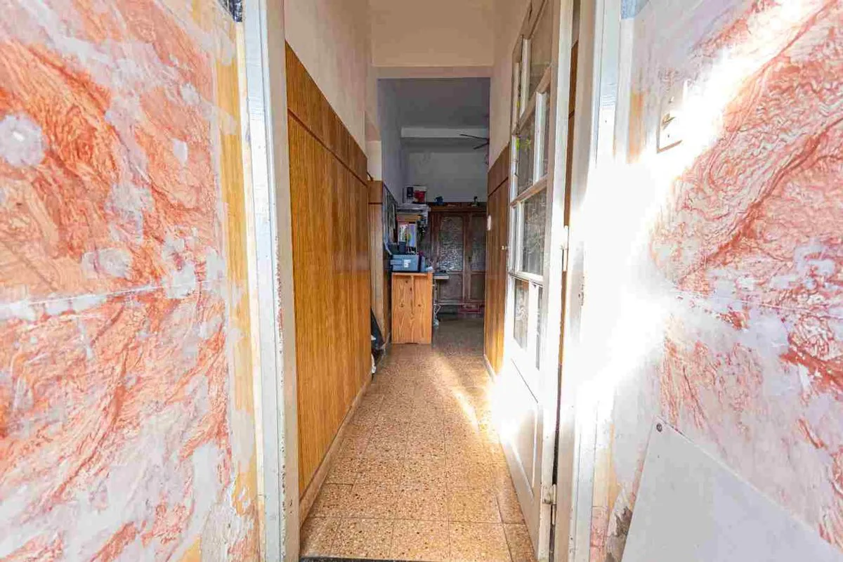VENTA DE CASA 6 DORMITORIOS, LOCAL Y COCHERA foto 5