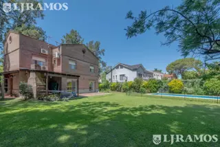 CASA CON DOBLE LOTE EN EL BARRIO CERRADO LA CHACRA, EN SAN FERNANDO foto 2