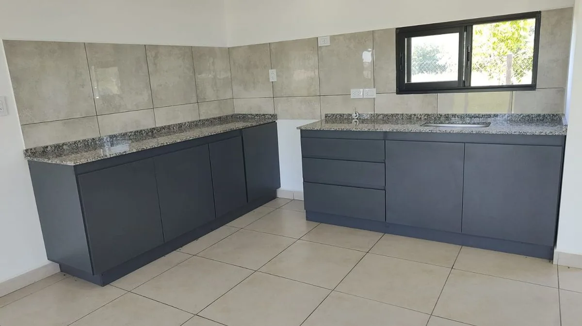 VENTA CASA DE 2 DORMITORIOS FUNES NORTE CREDITO foto 4