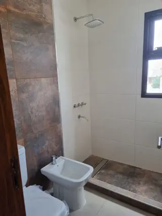 CASA A ESTRENAR EN BARRIO PRIVADO LOMAS DE RUSSELL foto 5