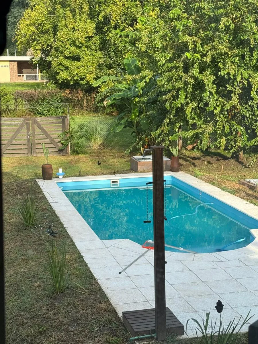 VENTA CASA DUPLEX CON PILETA VISTA AL RIO OLIVEROS foto 4