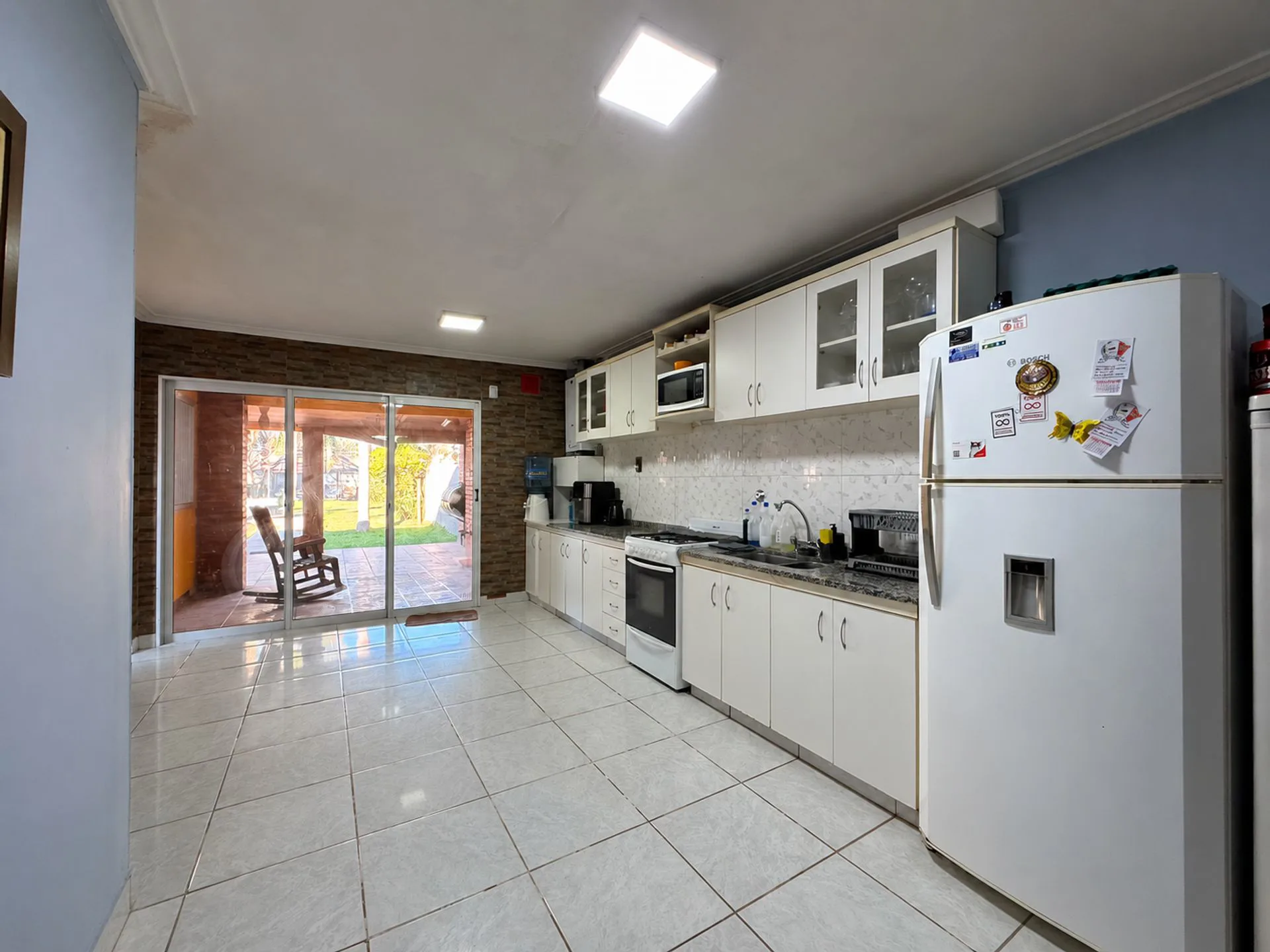 CASA EN VENTA DE 3 DORMITORIOS,COCHERA Y PATIO foto 4
