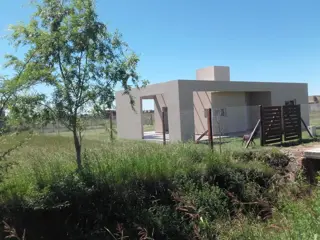 OPORTUNIDAD VENDE PROPIEDAD EN BARRIO ABIERTO FUNES NORTE ESTILO MODERNA foto 4