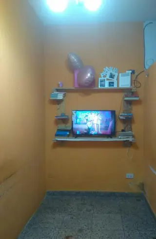 LOTE DE 8.66 X 17, FRENTE 2 LOCALES, 1 ADAPTADO PARA VIVIENDA CON PATIO Y ESPACIO AEREO PARA CONSTRUIR foto 5