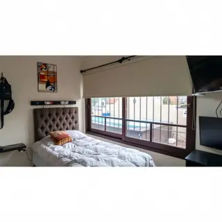 Oportunidad de Inversión en Ezpeleta Este: Casa de 4 Ambientes con Quincho y Conectividad Estratégica foto 3