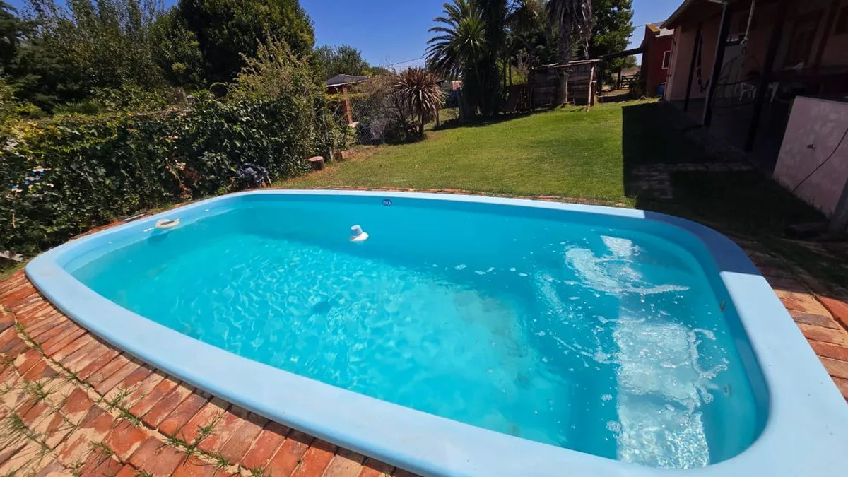 VENTA CASA QUINTA C/PILETA APTO CREDITO LAG LOBOS foto 4