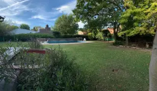 CASA 3 DORMITORIOS. PARQUE Y PISCINA. TERRENO 1575M2. FUNES. foto 1