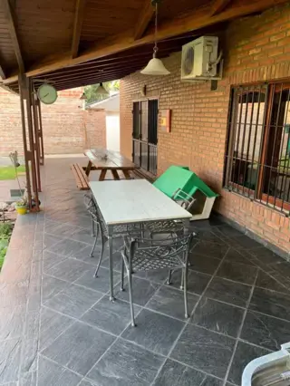 CASA 3 DORMITORIOS. PARQUE Y PISCINA. TERRENO 1575M2. FUNES. foto 5