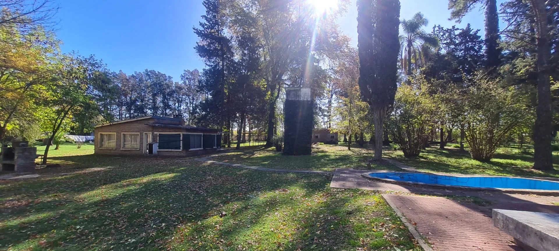 VENTA CHACRA EN PILAR. CON CASAS. 2 HECTAREAS. foto 2