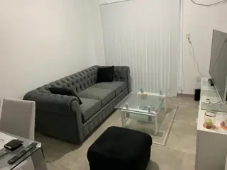 Departamento dos ambientes con cochera y balcon foto 1