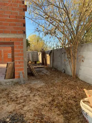 Lote en esquina  con entrada por ambos lados . Casa a terminar en Benavidez Barrio ElCano foto 4