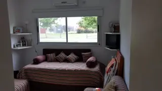 Venta Departamento Dormie PB  3 ambientes 2 dormitorios galeria parrilla jardin cochera en CC El Nacional foto 3