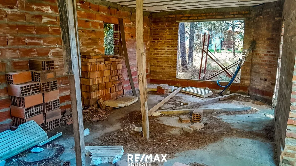 VENTA LOTE EN LAS DUNAS CON CONSTRUCCIÓN foto 5