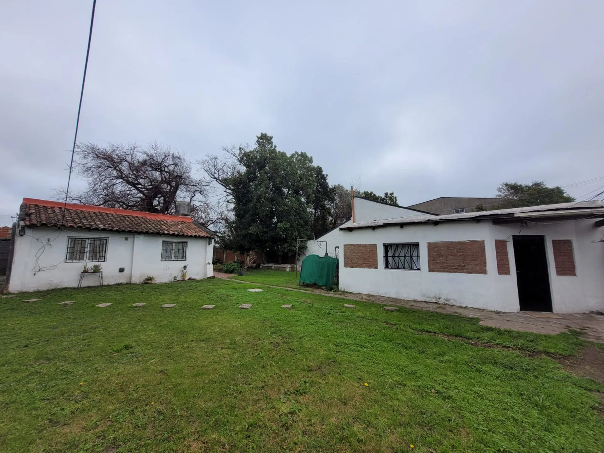 VENTA LOTE 599m2 CON CASA 4 AMB EN SAN MIGUEL foto 3