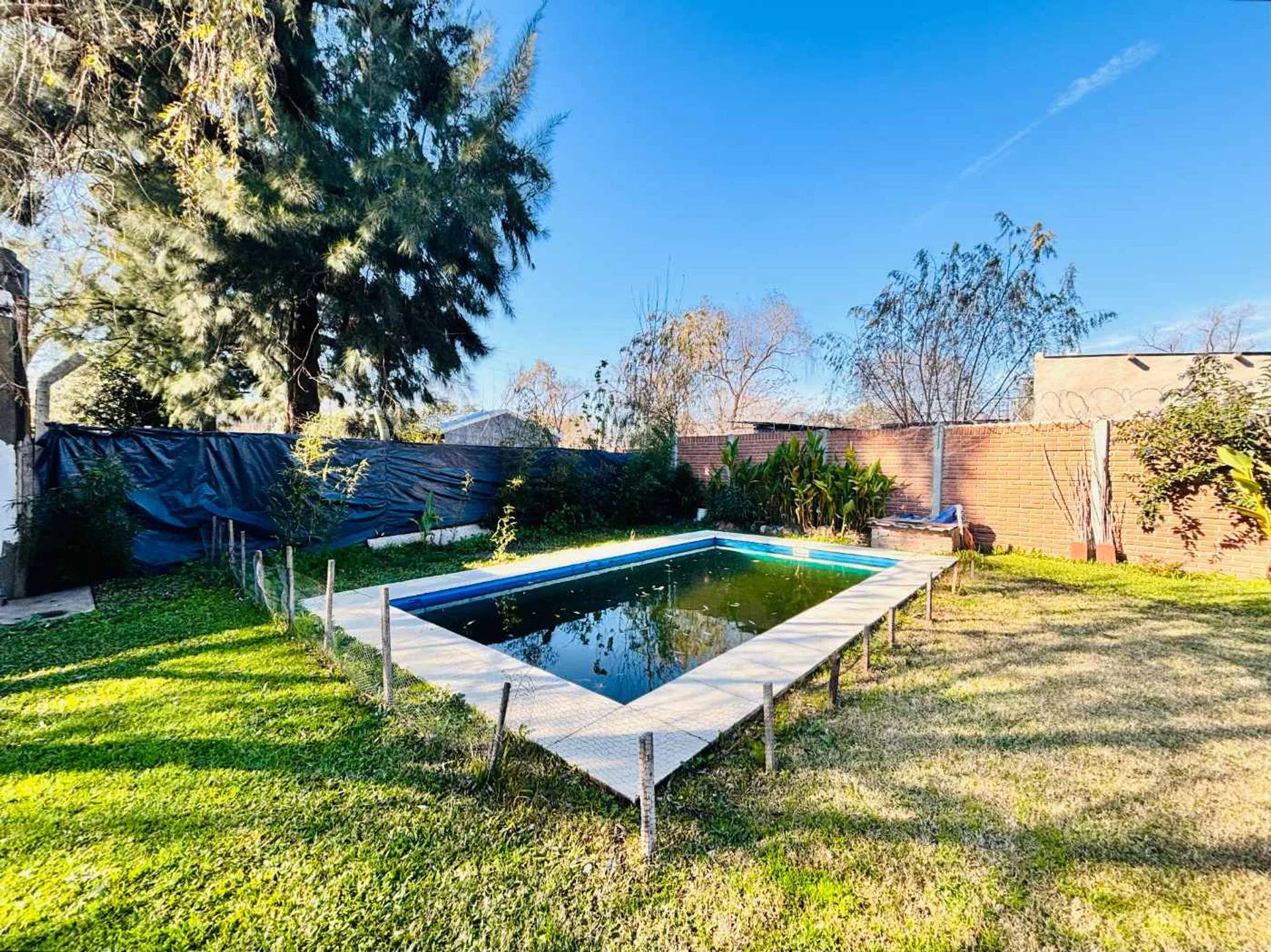 VENTA CASA/LOTE  EN GENERAL RODRIGUEZ CON PILETA foto 2