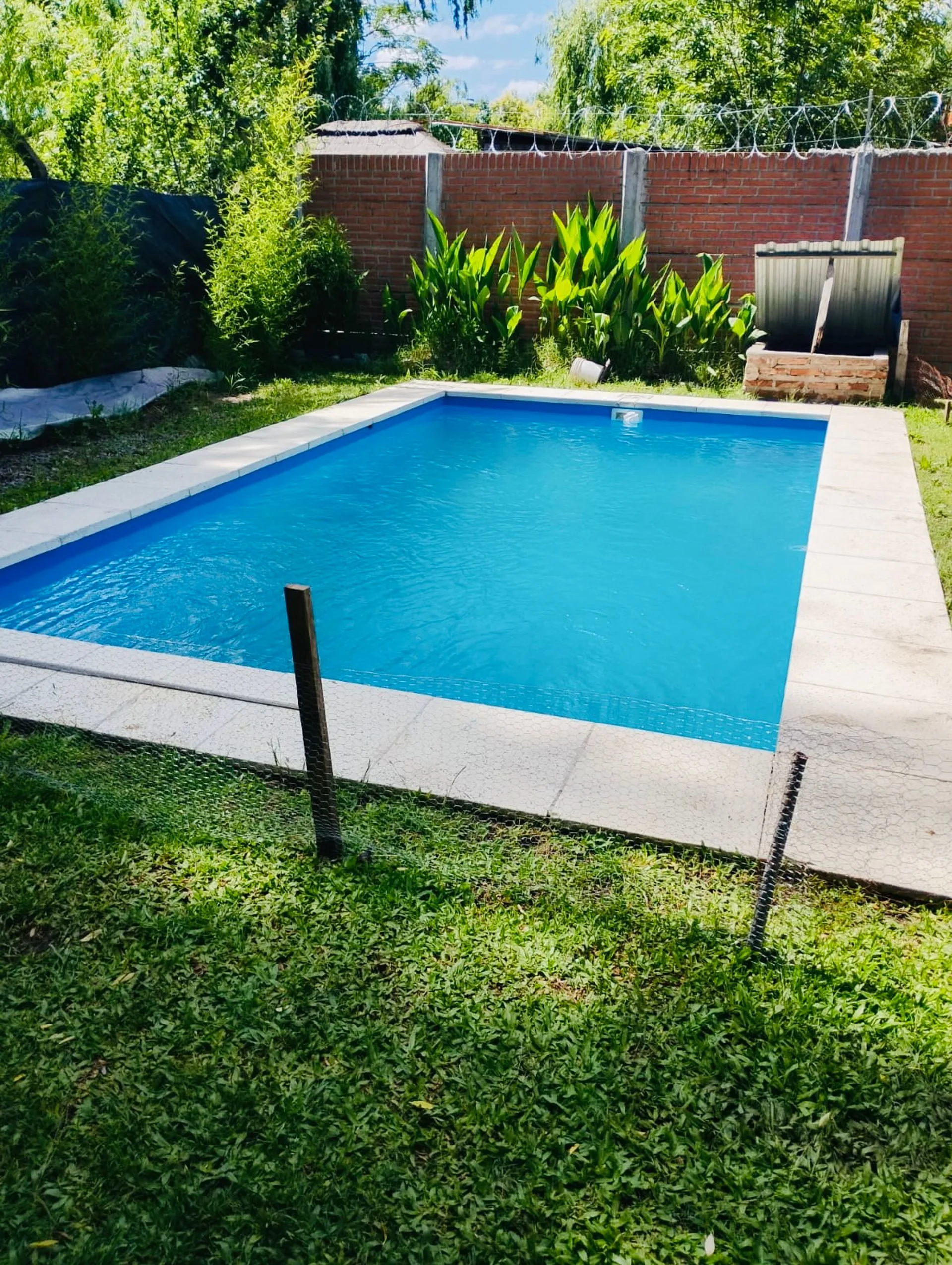 VENTA CASA/LOTE  EN GENERAL RODRIGUEZ CON PILETA foto 3