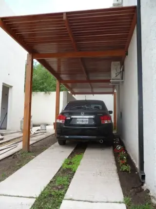 MODERNO DUPLEX. PARA 5 PERSONAS. DOS DORMITORIOS. COCHERA.PATIO CON ASADOR. PISCINA COMPARTIDA foto 3