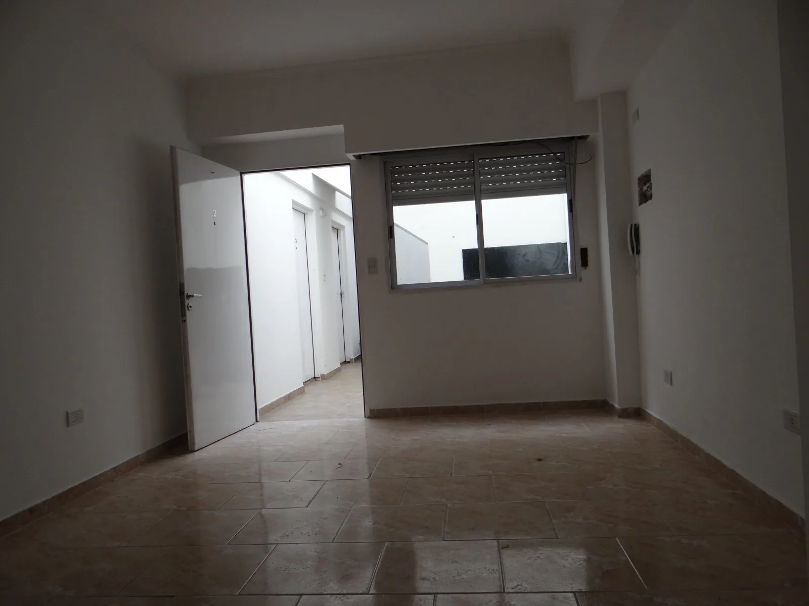 departamento 2amb en planta baja con fondo y parrilla foto 3