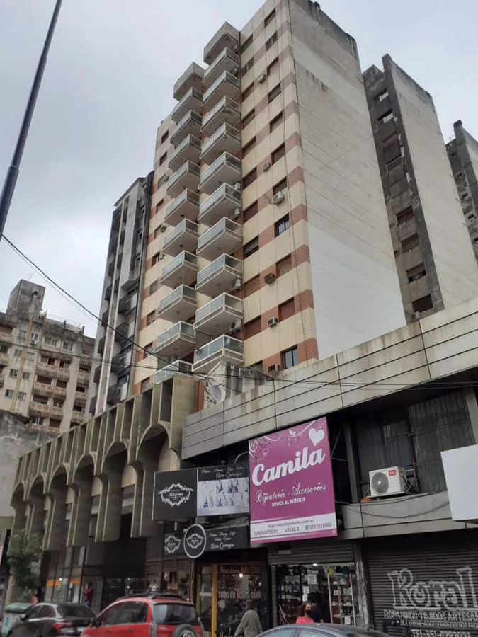 CENTRO Dos dormitorios con cochera Y ESCRITURA foto 3