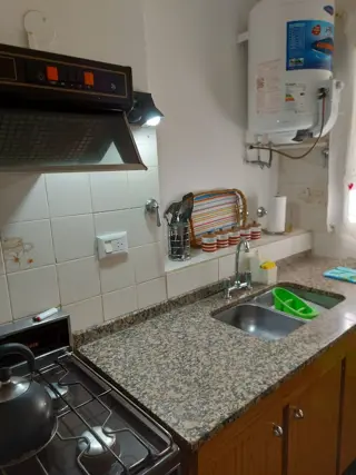 VENTA DE CASA EN CARLOS PAZ, CON 4 DEPARTAMENTOS Y LOCAL COMERCIAL SOBRE AV. ESTRADA. Estratégica Ubicación foto 4