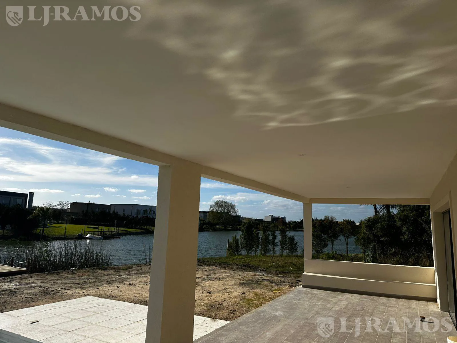 Casa en Venta A LAGUNA CENTRAL 360* de vista de agua PG foto 2