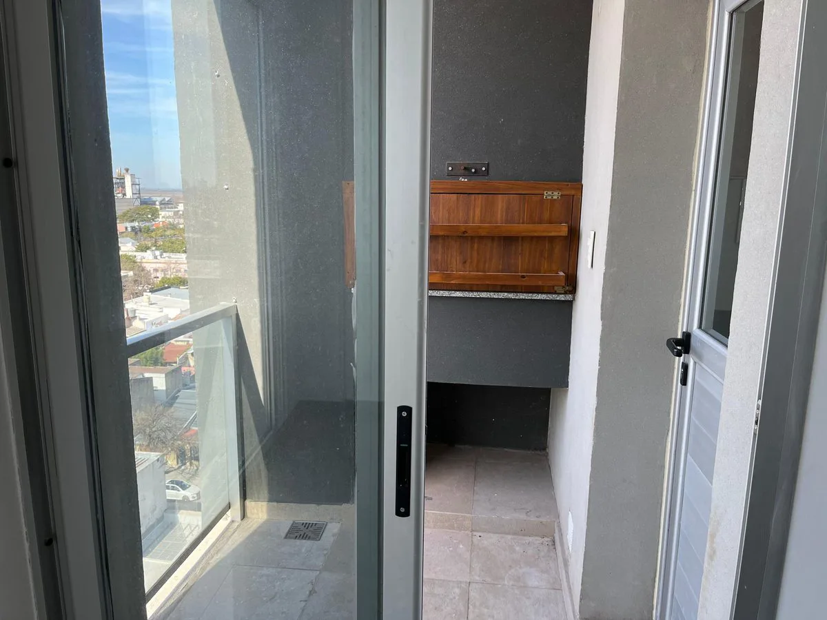 DEPTO 1 DORMITORIO CON COCHERA PISO 8 VISTA ESTE foto 2