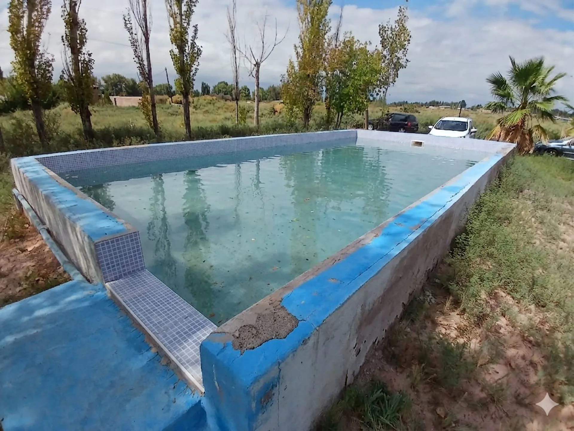Lote en Venta Los Corralitos pileta, quincho, casa foto 2