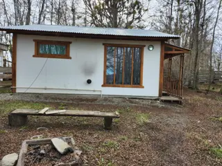 VENTA – PROPIEDAD CON 2 CASAS – TOLHUIN foto 3