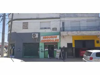 Venta en Bloque de 3 locales y 2 departamentos centro de Paso del Rey, Calle Mitre foto 1