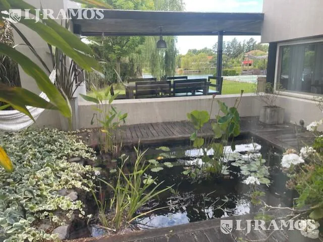Casa al agua en barrio La laguna -Rincón de Milberg foto 5
