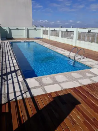 Monoambiente Corrientes al 6400 con cochera piso 9 vista a parque Pileta SUMA Laundry foto 5