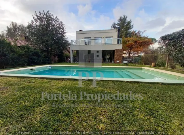 CASA EST. MINIMALISTA CON PILETA EN BARRIO PRIVADO foto 3