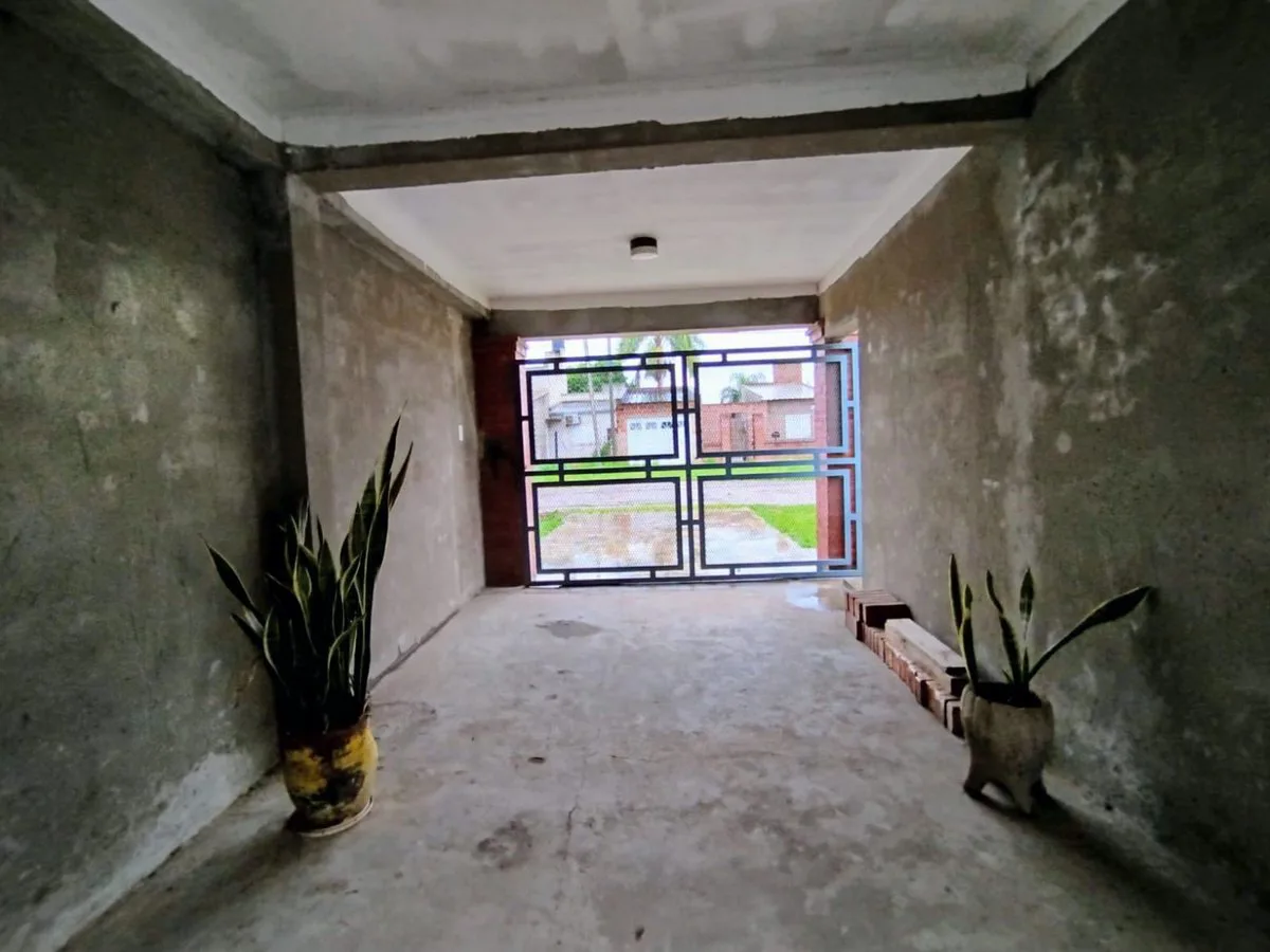 CASA 4 DORMITORIOS Y PATIO EN SANTO TOME foto 4