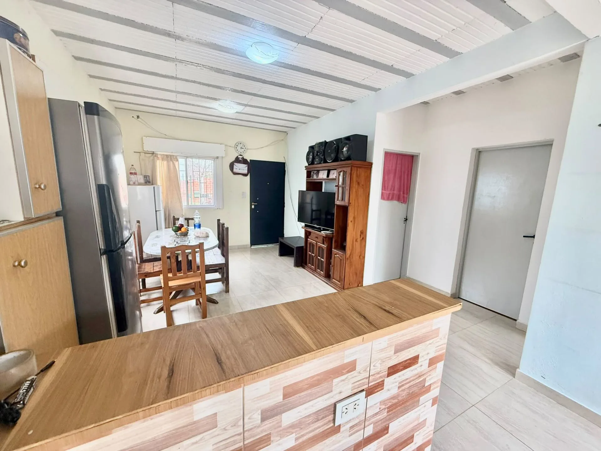 VENTA CASA 3 AMBIENTES PARRILLA TIGRE foto 2