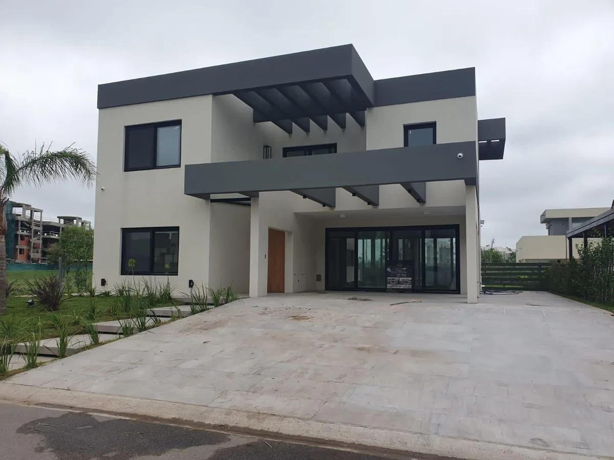 ALQUILER  CASA A ESTRENAR EN LAGOON PILAR foto 4