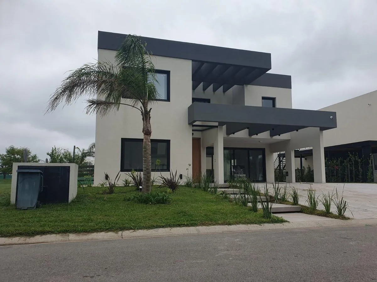 ALQUILER  CASA A ESTRENAR EN LAGOON PILAR foto 5