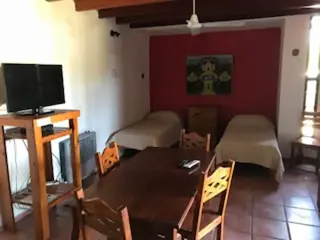OPORTUNIDAD PROPIETARIO LIQUIDA COMPLEJO DE CUATRO CABAÑAS A MTS. DEL RÍO SAN ANTONIO foto 1