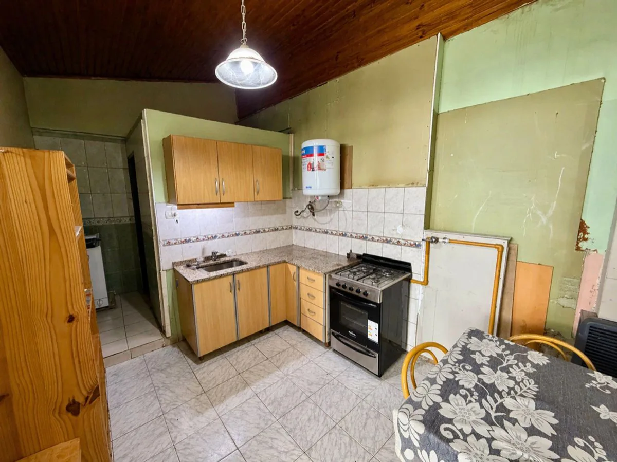 VENTA O PERMUTA casa + local + dptos Ushuaia. foto 2