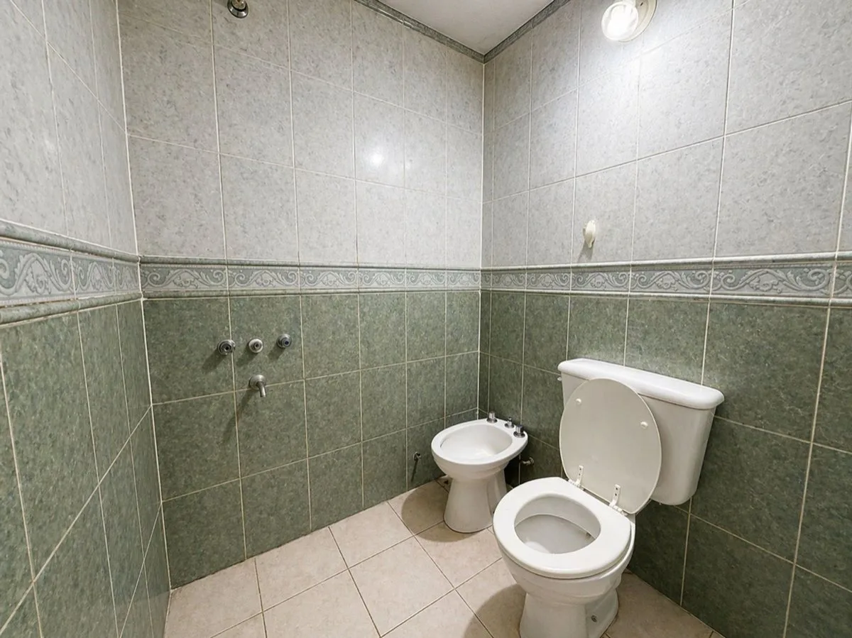 VENTA O PERMUTA casa + local + dptos Ushuaia. foto 4