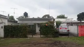 EXCELENTE PROPIEDAD MULTIFAMILIAR, CON ENTRADA DE AUTO Y FONDO LIBRE foto 1