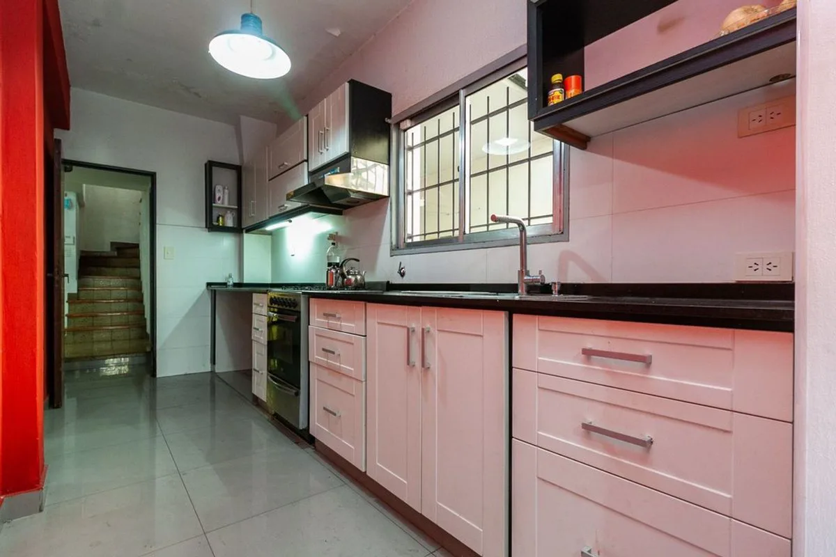 CASA 5 AMB LOTE PROPIO JARDÍN QUINCHO COCHERA foto 5