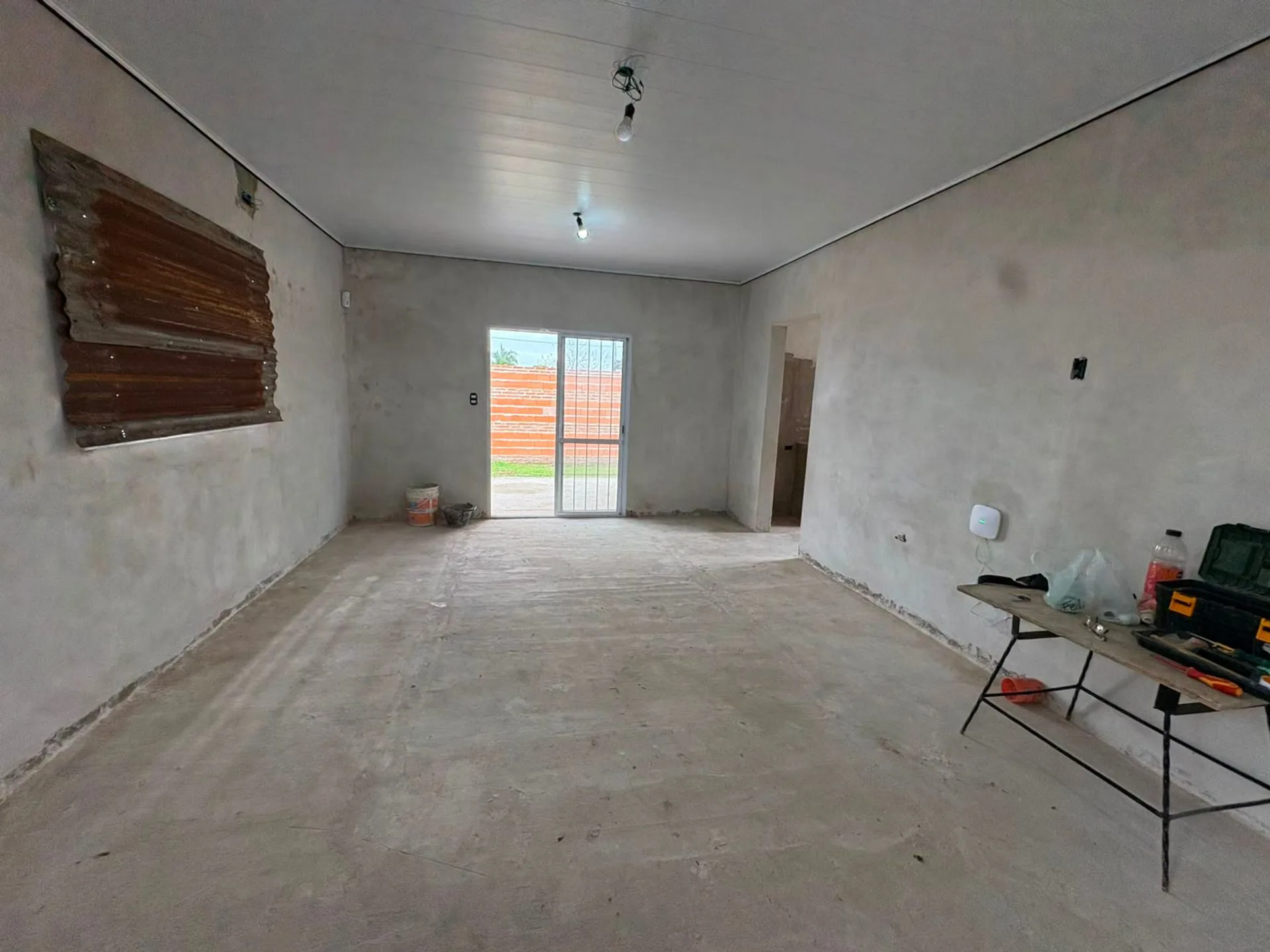 CASA A ESTRENAR DE DOS DORMITORIOS,COCHERA PATIO. foto 2