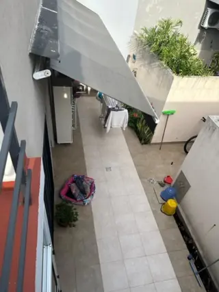 3 AMBIENTES CON PATIO  COMPLEJO CON POCAS UNIDADES , APROX 100 M2 TOTALES , EN DOS PLANTAS foto 3