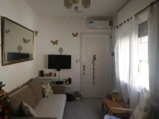 Hermoso y cómodo departamento de tres ambientes con cochera en venta en San Isidro. foto 1