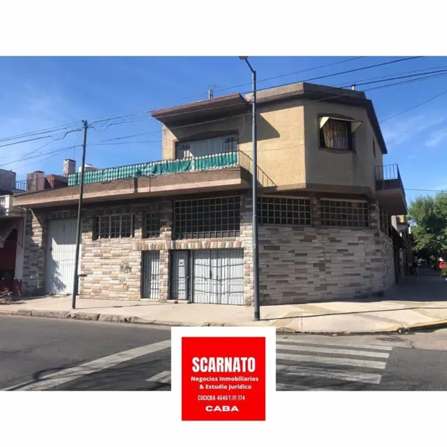 Venta casa con depósito y local. Lote de 31 de frente x 18