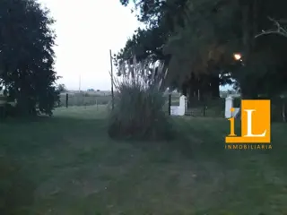 13 hectareas con mejoras en Loma Verde, sobre Ruta 215. foto 3