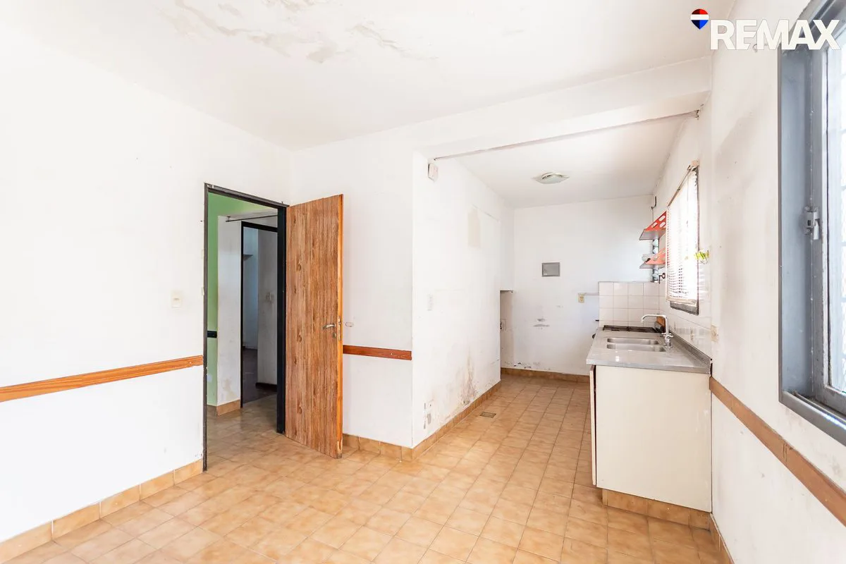VIVIENDA MULTIFAMILIAR CIUD. EVITA 3 DEPARTAMENTOS foto 2