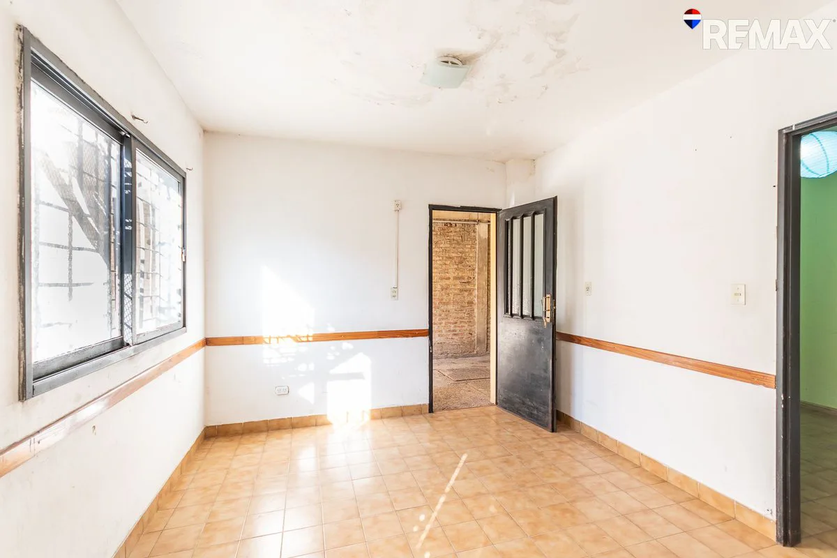 VIVIENDA MULTIFAMILIAR CIUD. EVITA 3 DEPARTAMENTOS foto 3