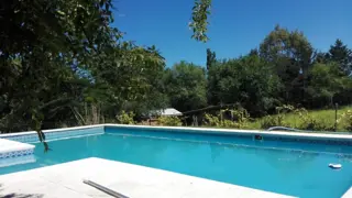 Los Reartes. Complejo de tres hermosas casas con espectacular pileta de 10 mts x 4 mts. a 100 mts del Rio foto 1