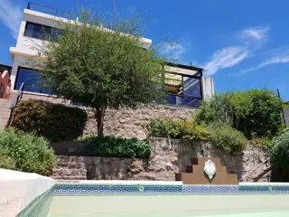 EXCELENTE CASA EN VENTA EN VILLA CARLOS PAZ, 3 DORMITORIOS, PILETA,VISTA PANORÁMICA, HERMOSA. foto 5